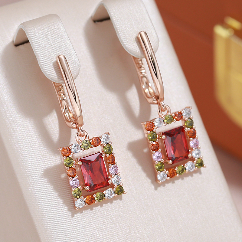 Chic Gold Earrings Adorned with Dazzling Red Cubic Crystals