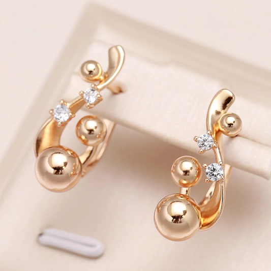 Radiant Gold Earrings Adorned with Dazzling Cubic Zirconia Gems