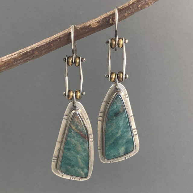 Timeless Vintage Earrings Adorned with Dazzling Green Gemstone, Crafted from Premium Silver