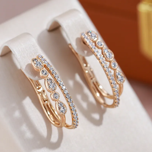 Elegant Gold Earrings Adorned with Dazzling Zirconia Stones