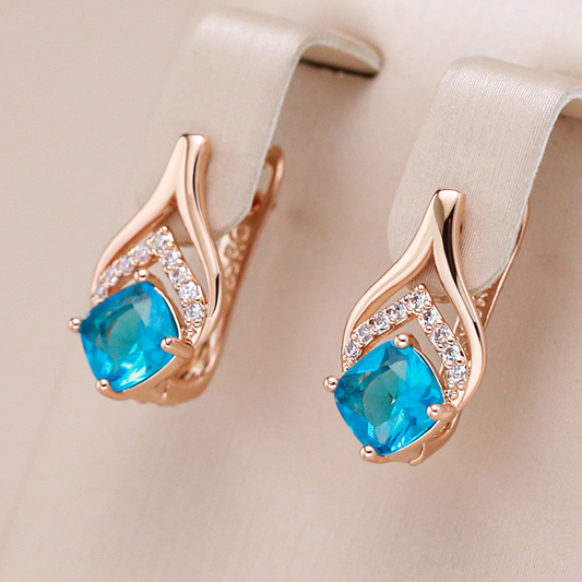 Stunning Gold-Plated Earrings Adorned with Dazzling Blue Crystals