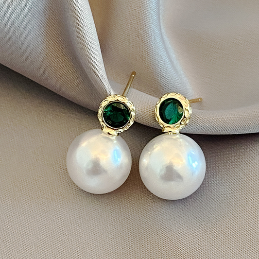 Elegant pearl earrings with sparkling green crystal