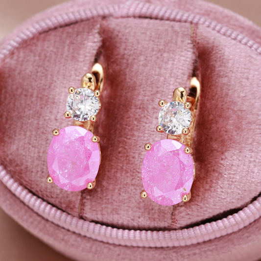 Elegant Golden Earrings Adorned with Dazzling Pink Zirconia