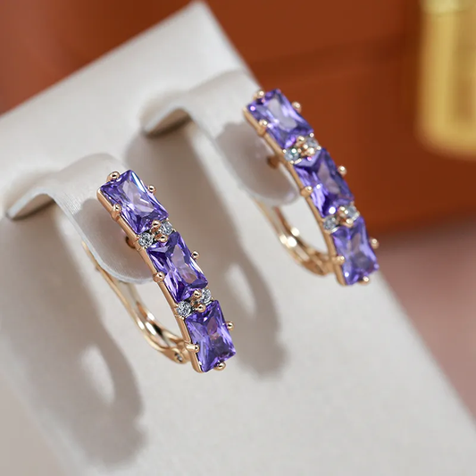 Stunning Golden Earrings Adorned with Dazzling Violet Crystals