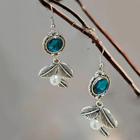 Charming Vintage-Inspired Earrings featuring Gorgeous Pearls and a Stunning Blue Crystal Leaf