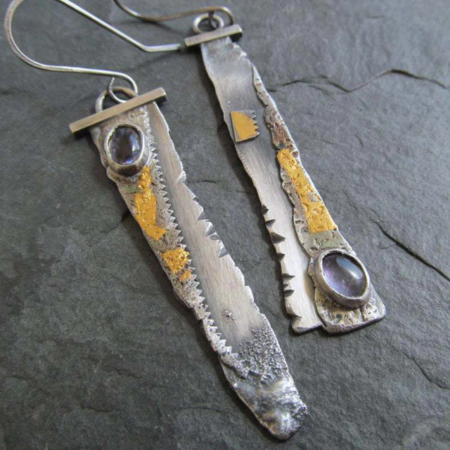 Chic Vintage Silver Earrings with Intricate Saw Design