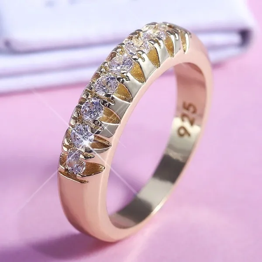 Elegant ring with sparkling zirconium dioxide inlays