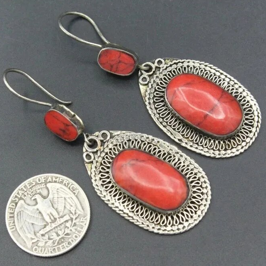 Elegant Vintage Earrings Adorned with Dazzling Red Gems