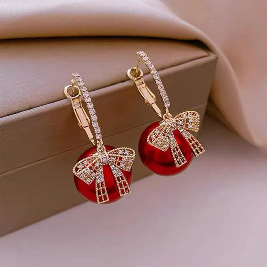 Stylish tie with enchanting red bead earrings