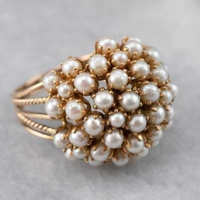 Elegant ring with enchanting pearl accents