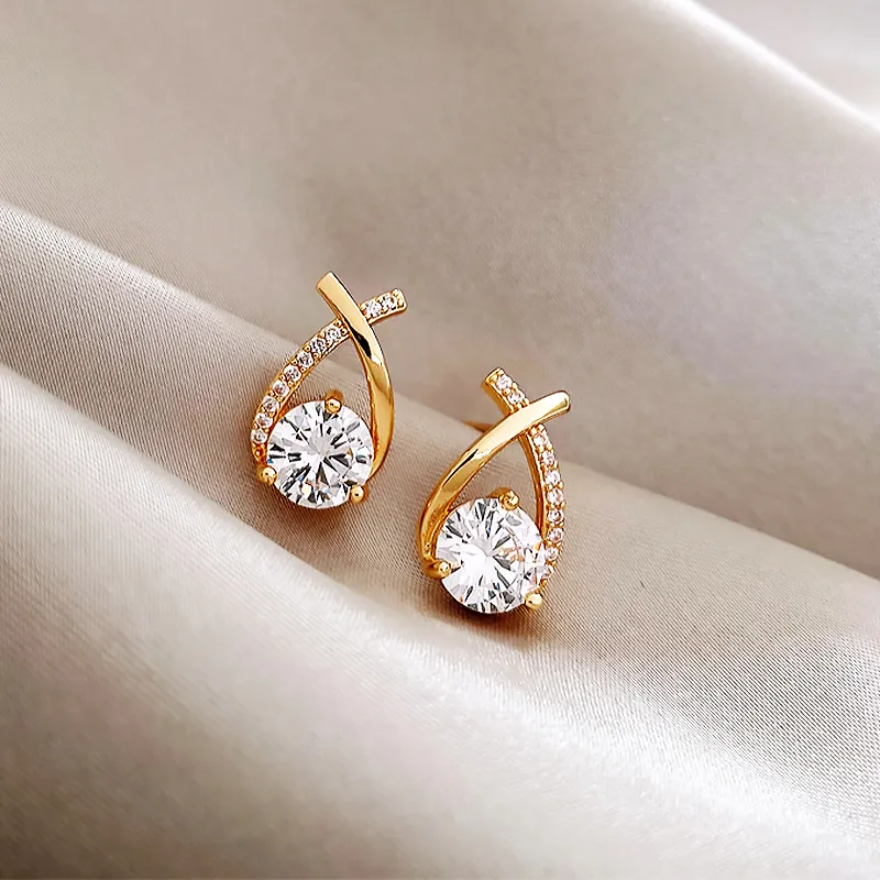 Radiant and Chic Earrings Adorned with Dazzling Cross-Shaped Zirconia Gemstones