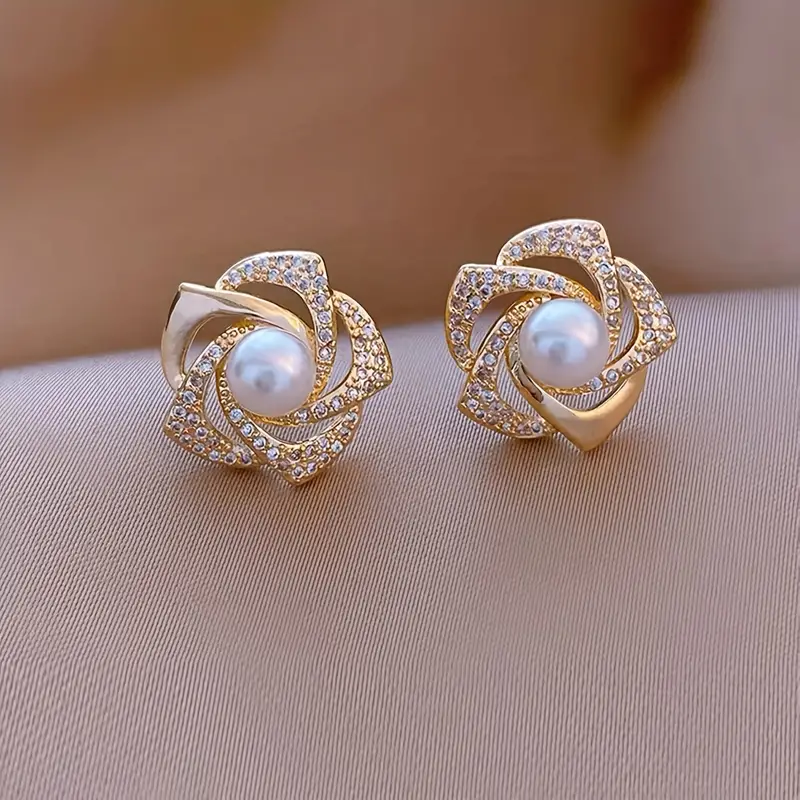 Stylish spiral earrings with radiant pearls