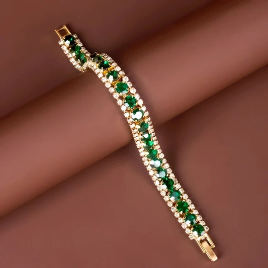 Elegant bracelet in shimmering gold and radiant green