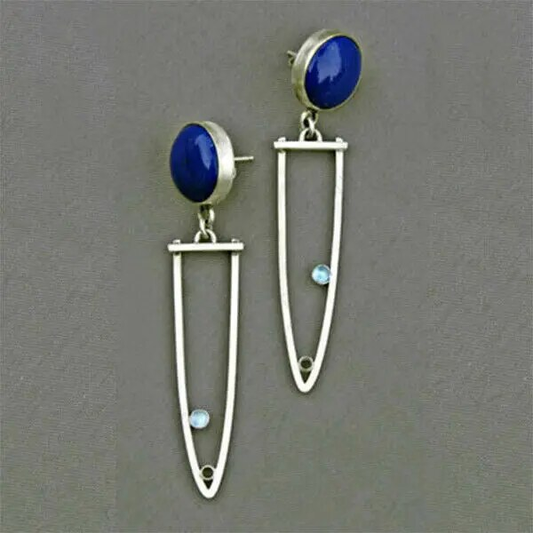 Chic Silver Earrings Adorned with Timeless Blue Vintage Gemstones