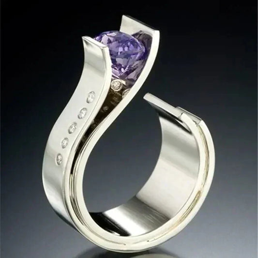 Elegant vintage ring with sparkling purple crystal and fine silver