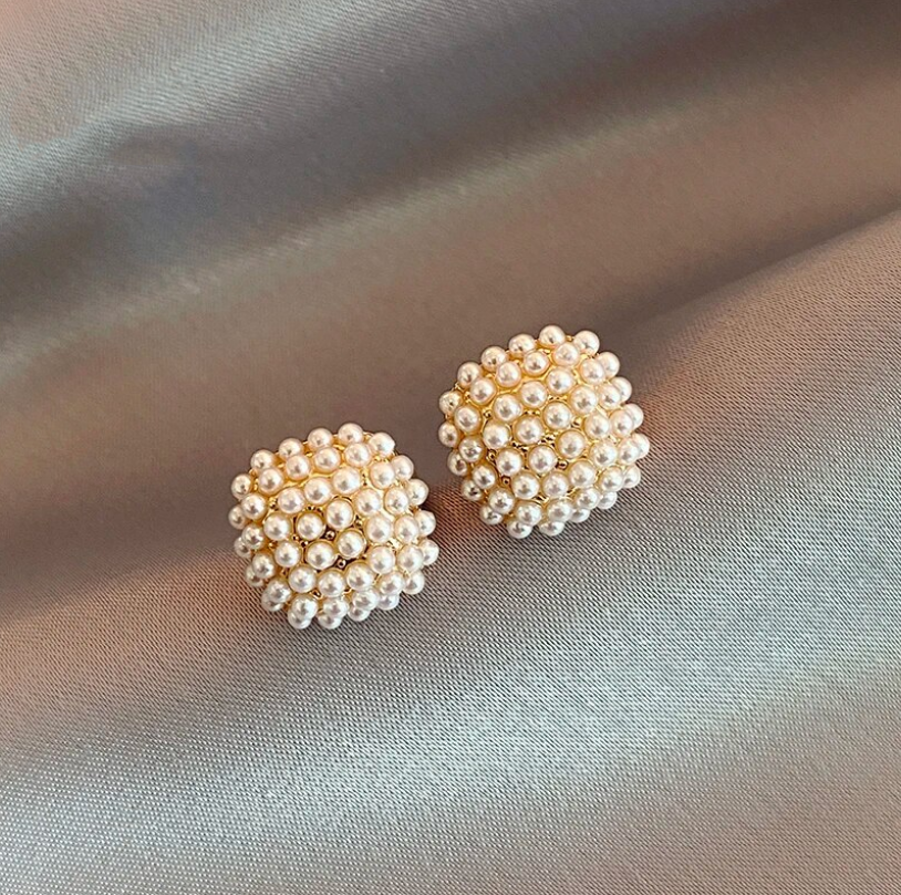 Fine gold earrings with exquisite pearl embellishments