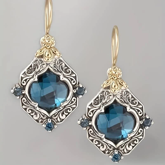 Stunning Blue Crystal Earrings Set in Luxurious Gold and Silver