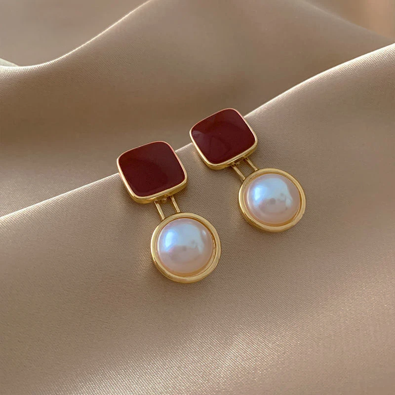 Stunning Crimson Earrings adorned with Exquisite Pearls