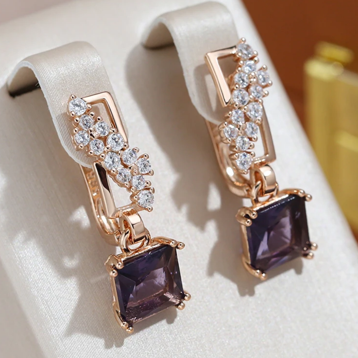 Dazzling Earrings Adorned with Luxurious Gilded Dark Crystals