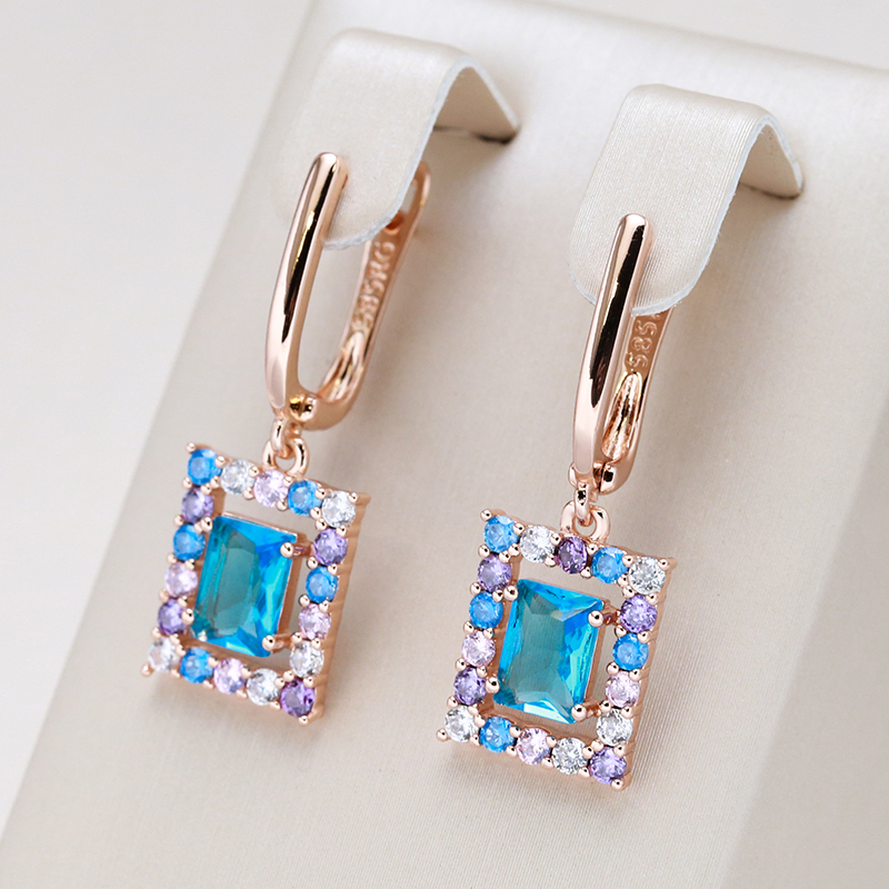 Chic Gold Earrings Adorned with Dazzling Blue Cubic Crystals