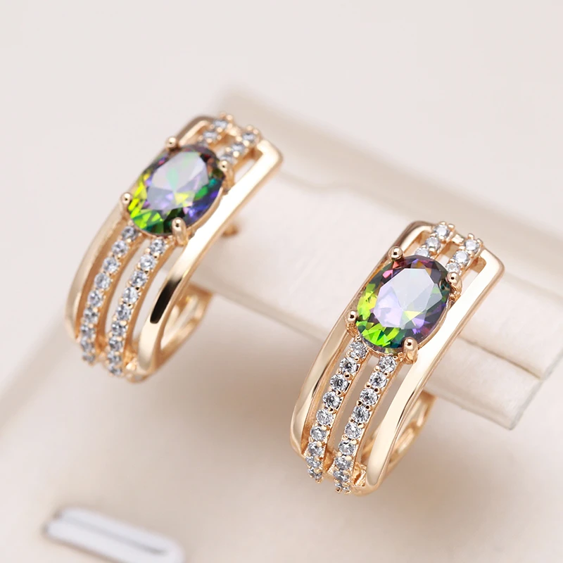 Elegant Gold Earrings Adorned with Dazzling Zirconia and Opulent Green Crystal