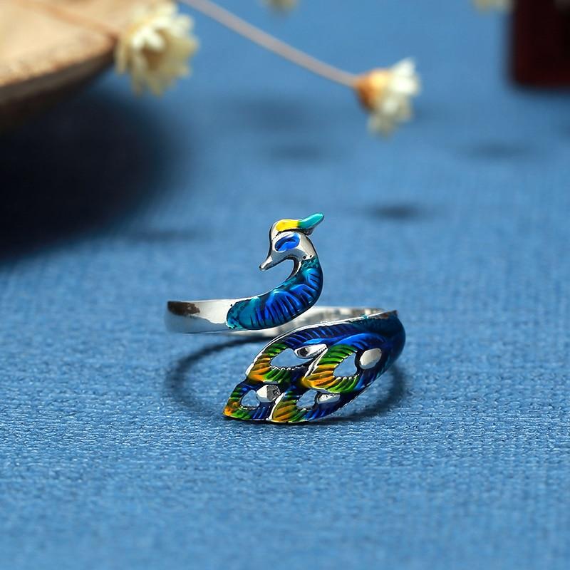 Elegant Adjustable Sterling Silver Ring with Hand-Painted Peacock Design